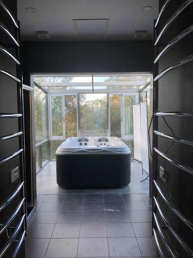 Glass atrium spa bath