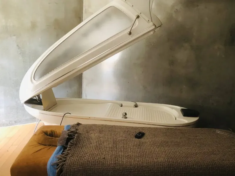 Treatment room with steam pod and massage table