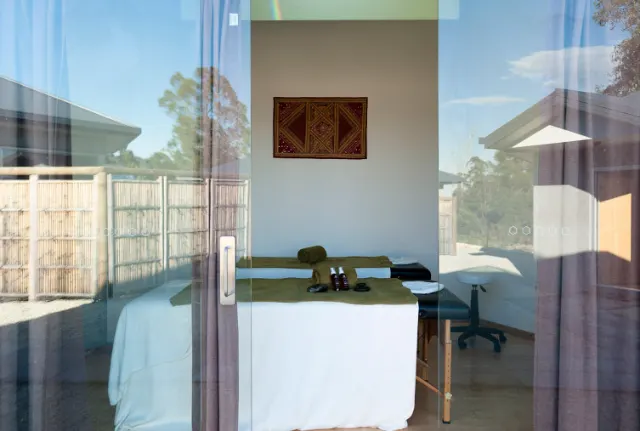 Treatment room seen through glass doors